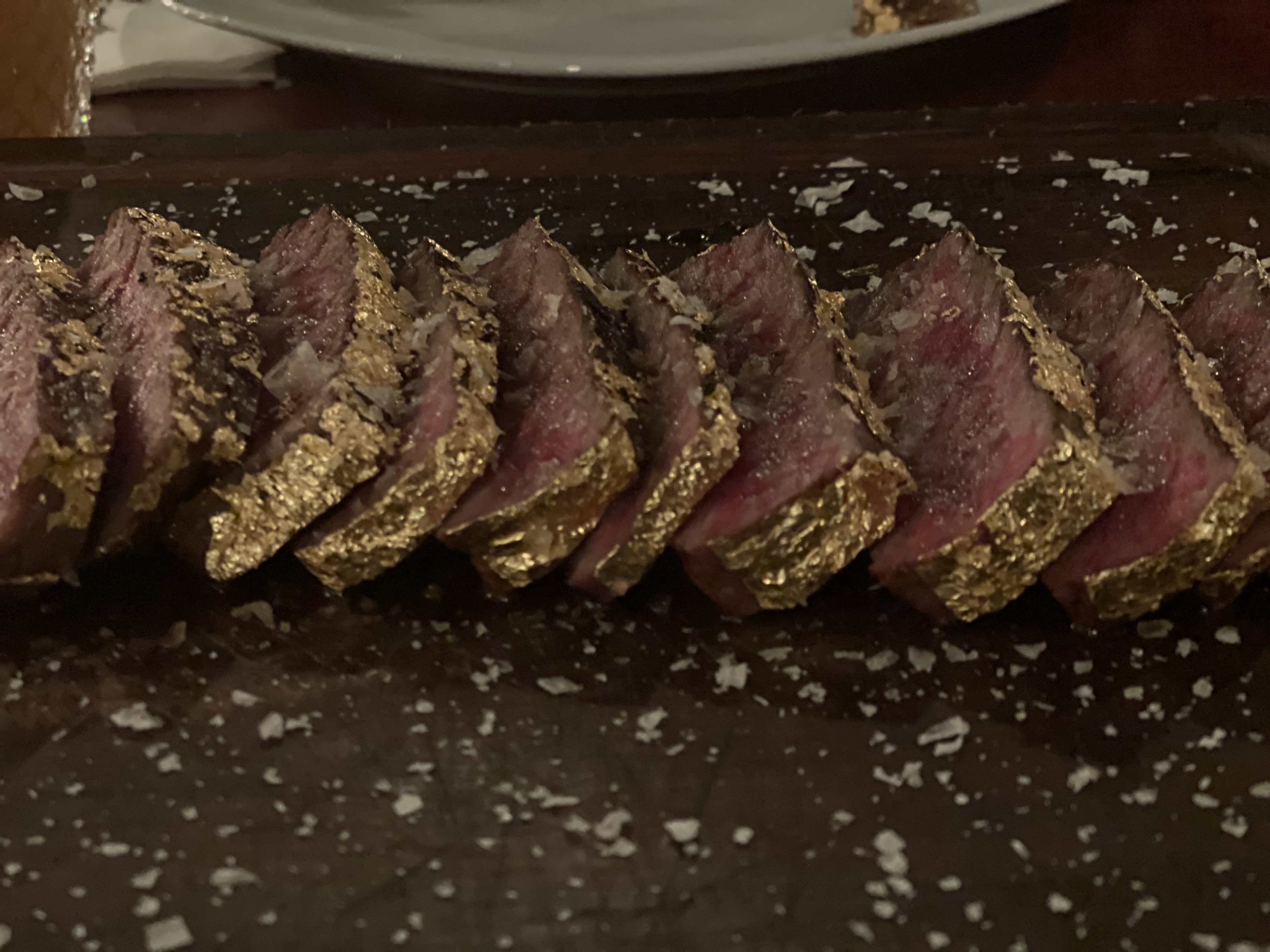 Salt Bae gold-leaf steak at Nusr-Et Dubai — Neola Husbands plate from a pandemic-era visit to the UAE